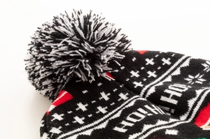 Bonnet de Noël tricoté avec pompon personnalisable